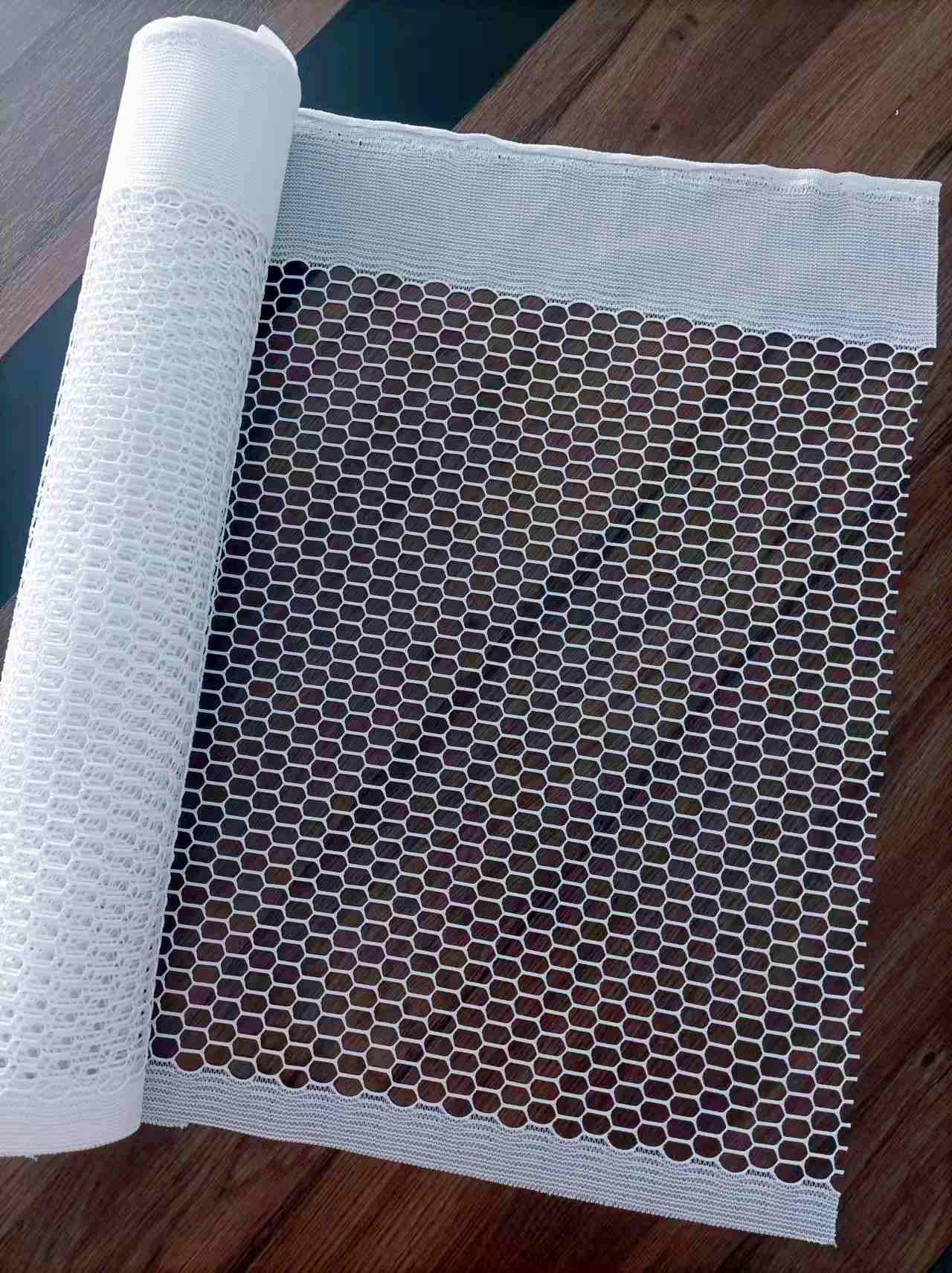Maille de rideau de cabine
